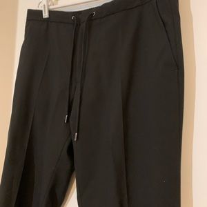 Hugo Boss mens black pants size 36R. Drawstring, hook and bar, and zipper.